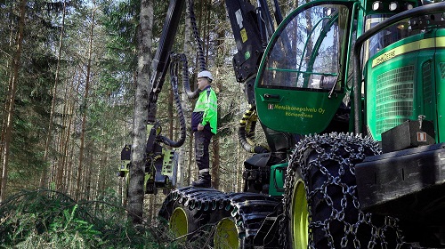worker and machinery