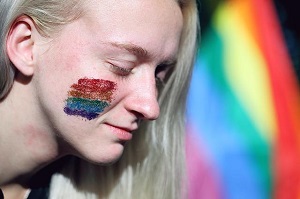 woman with rainbow flag