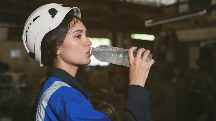Worker drinking water