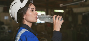Worker drinking water