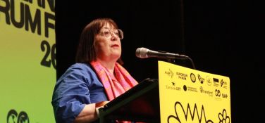 Esther Lynch speaking at the International Forum for Peace 2025